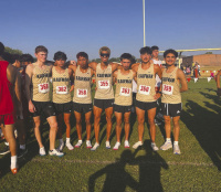 Lions boys’ cross country take fi rst in Mineola