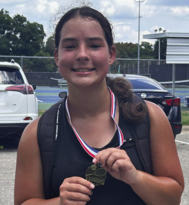 Photos courtesy of Michael Lott Kaufman tennis players finished out their summer circuit series at Wills Point for the last weekend of July.