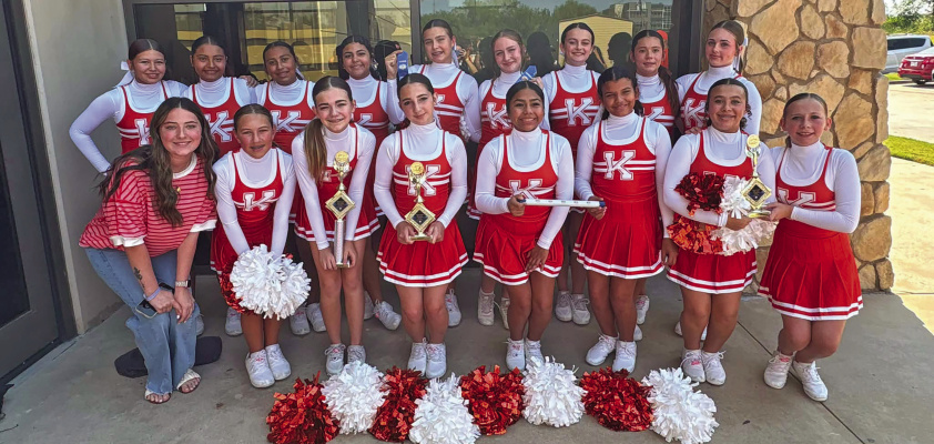 The Kemp Junior High cheer squad brought home multiple awards and some hardware after competing at UCA Cheer Camp near the end of July. Photo courtesy of Kemp ISD