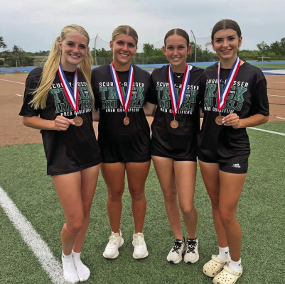 Pictured at the Area meet in Keene on April 17 are the mile relay team of Mia Lathem (from left), Alyssa Harrison, Emily Ross and Hannah McCarty. Photo courtesy of James Hill