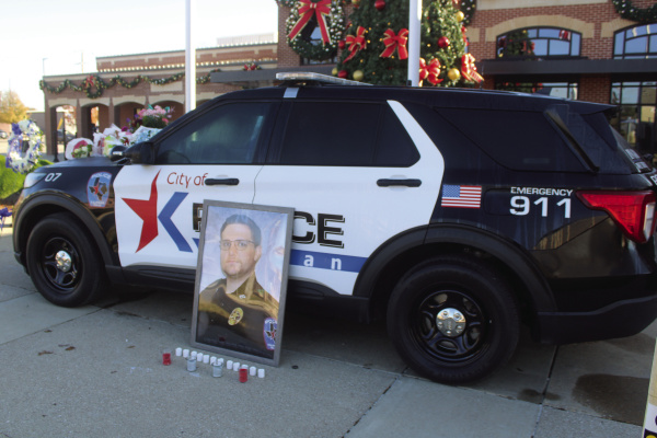 The City of Kaufman Police Department set up a memorial out in front of their station for Austin Cooley, who was killed in a motor vehicle crash in the early morning hours of Monday, Dec. 8. Photo by Bodey Cooper
