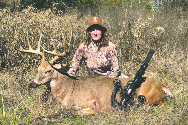 Carol Little with a fine buck she took last week at the Choctaw Hunting Lodge in southeast Oklahoma. Carol and her husband Mark bought the hunt through an auction at the Dallas Safari Club. The Choctaw Nation is a strong supporter of DSC and shows support through donating hunts such as this. Photo Courtesy of Luke Clayton