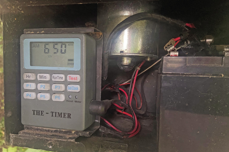 A quality timer is a must on any game feeder. With the invention of “The Timer” pictured here, the guesswork of ‘when’ a feeder throws corn was solved. Photo by Luke Clayton