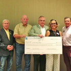The Metro East Division of the Dallas Builders Association presents a $110,435 check to Lone Star CASA. Courtesy Photo